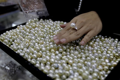 Cropped image of woman with hand