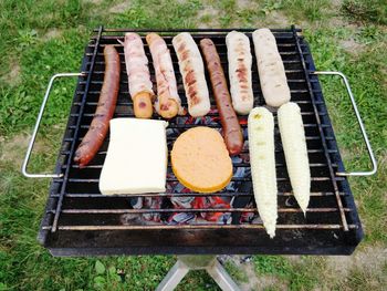 High angle view of food on barbecue grill