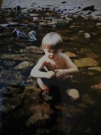 Boy playing in water