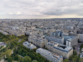 Aerial city landscape of paris, lots of roofs characteristic roofs and chimney