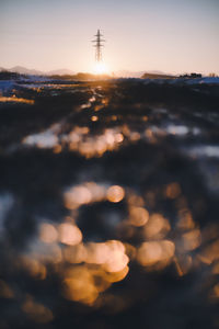 Scenic view of silhouette city against sky during sunset