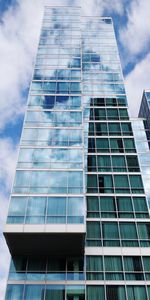 Low angle view of modern building against sky