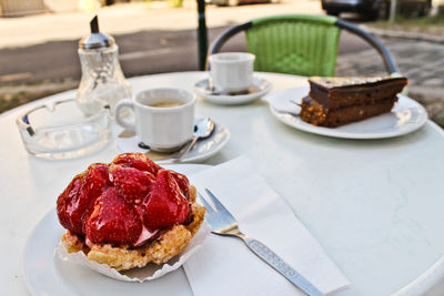 Close-up of cake served on table