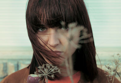 Close-up portrait of young woman