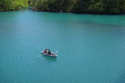 High angle view of people on sea