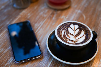 High angle view of coffee on table