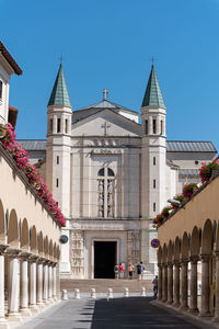 View of buildings against blue sky