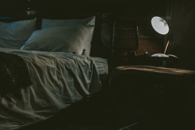 Man lying down on bed at home