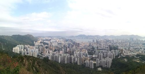 Aerial view of townscape against sky