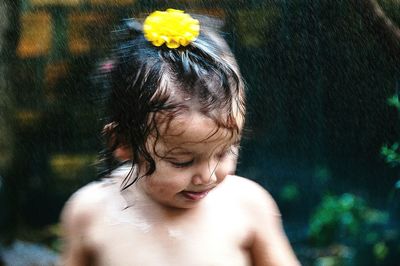 Close-up portrait of shirtless boy