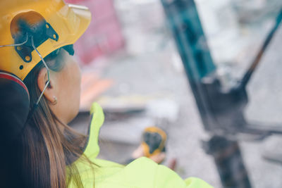 Close-up of woman at construction site