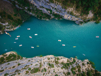 High angle view of rocks by sea