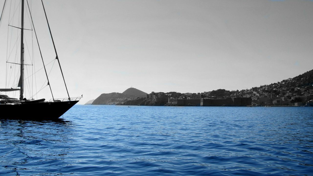 BOATS SAILING ON SEA