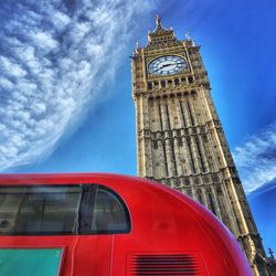 Low angle view of clock tower against clear sky
