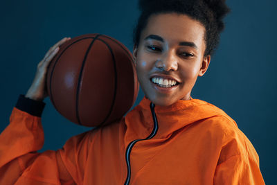 Young man playing basketball