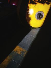 High angle view of yellow shadow on floor