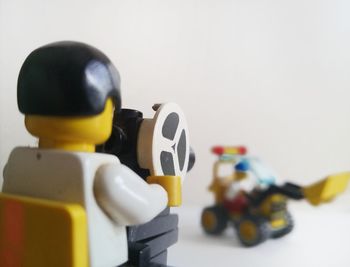 Close-up of toy car against white background