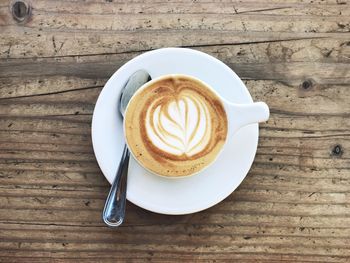 Directly above shot of cappuccino on table