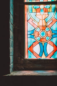Close-up of glass window in old building