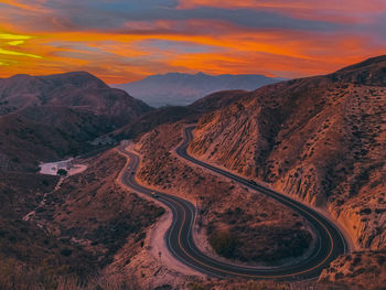 High angle view of mountains against sky during sunset