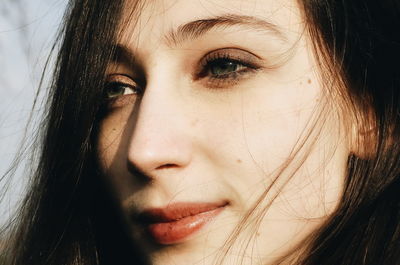 Close-up portrait of young woman