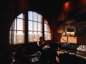 People sitting at home