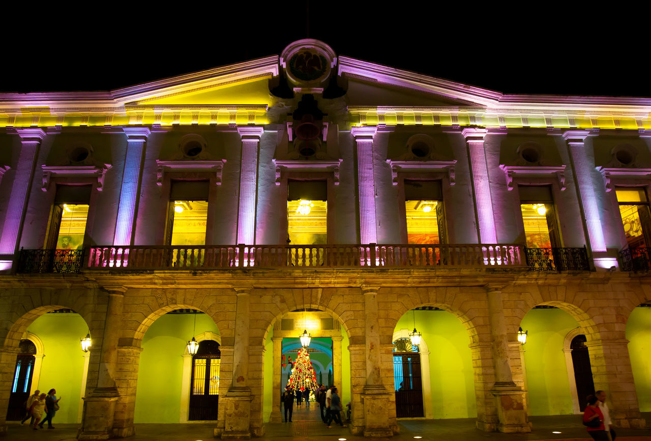 LOW ANGLE VIEW OF ILLUMINATED HISTORICAL BUILDING