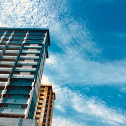 Low angle view of modern building against sky