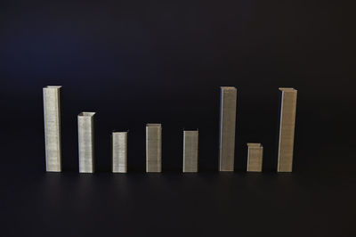 Close-up of wooden structure against black background