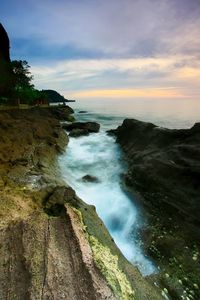 Scenic view of sea against sky during sunset