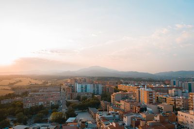 High angle shot of townscape against sky