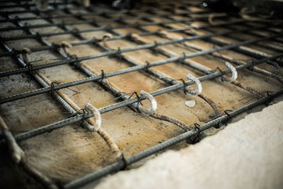 High angle view of barbed wire fence