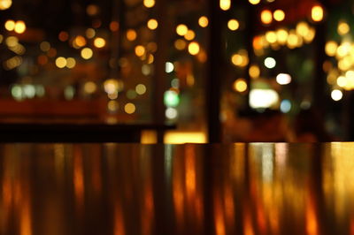 Defocused image of illuminated lights at night