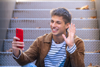 Young woman using mobile phone