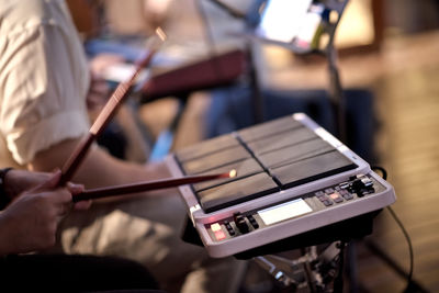 Close-up of hand drumming