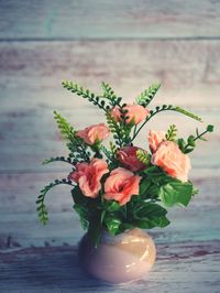 Close-up of flowers in vase on table