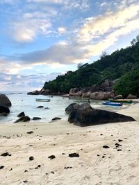 Scenic view of beach against sky