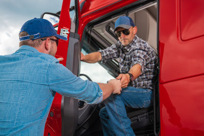 Portrait of young man using mobile phone