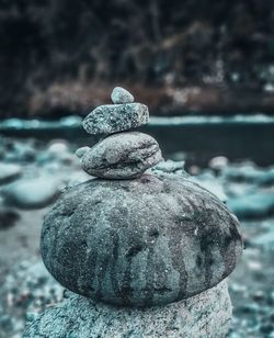 Close-up of stone stack on rock