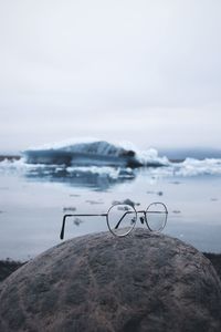 Scenic view of sea against sky during winter