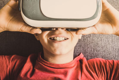 Close-up of boy wearing virtual reality sunglasses