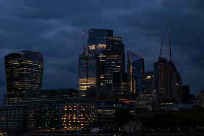 Illuminated buildings in city at night