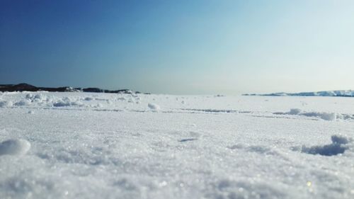 Scenic view of calm sea against clear sky