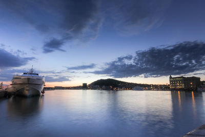 Scenic view of sea against sky at dusk