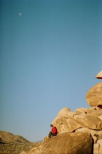 Scenic view of mountains against clear blue sky