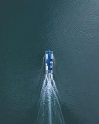 High angle view of ship sailing on sea