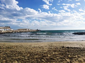 Scenic view of beach against sky