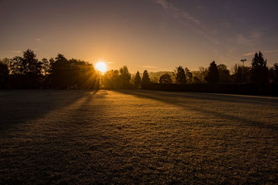 Scenic view of landscape against sky during sunset