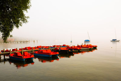 Boats moored in marina