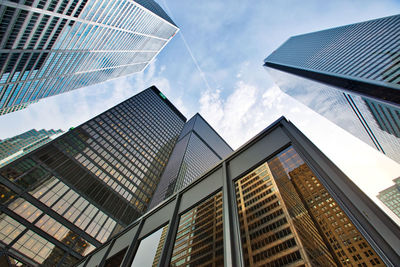 Low angle view of modern buildings against sky